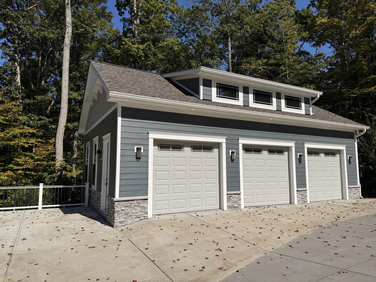 The Collector's Garage three-bay garage front