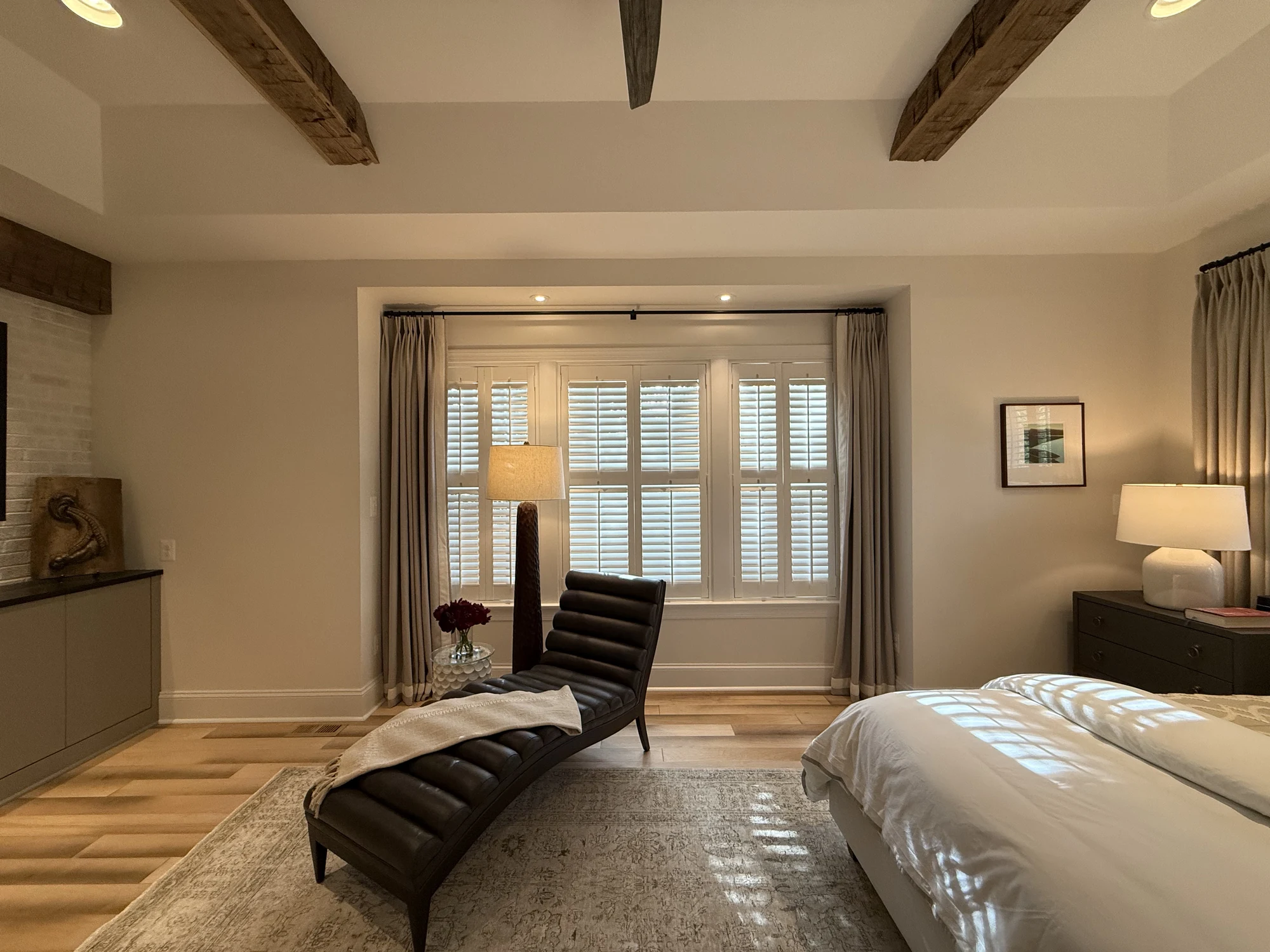 The Primary Suite Retreat bedroom cabinetry and bay