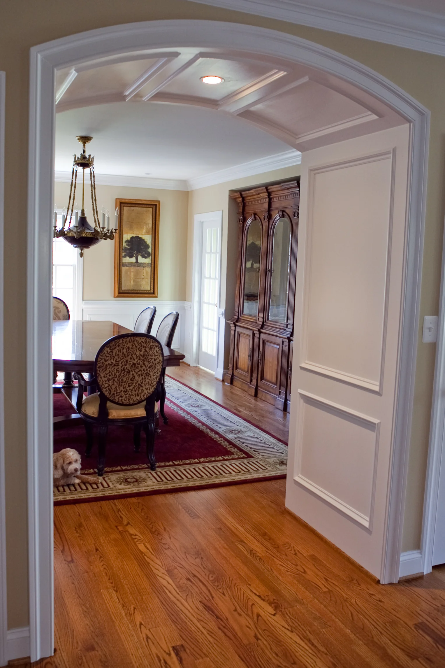 Seamless Two-Story Addition arched opening to dining room